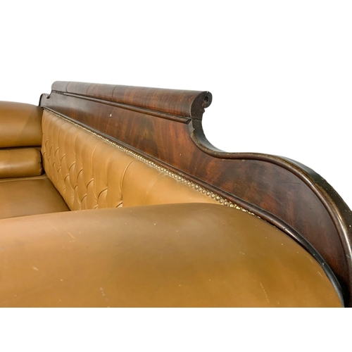 1090 - Large Victorian button back leather stuffed over sofa. 218/67/103cm.