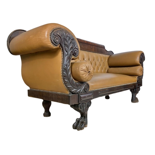 1090 - Large Victorian button back leather stuffed over sofa. 218/67/103cm.