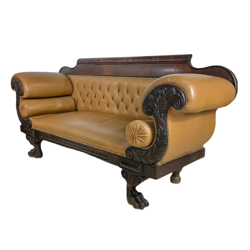 1090 - Large Victorian button back leather stuffed over sofa. 218/67/103cm.