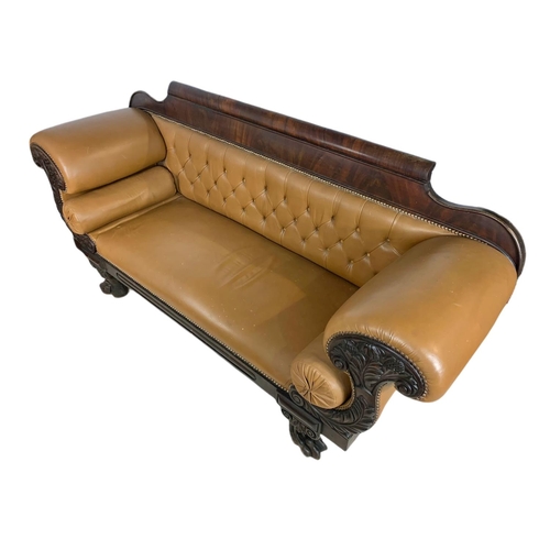 1090 - Large Victorian button back leather stuffed over sofa. 218/67/103cm.