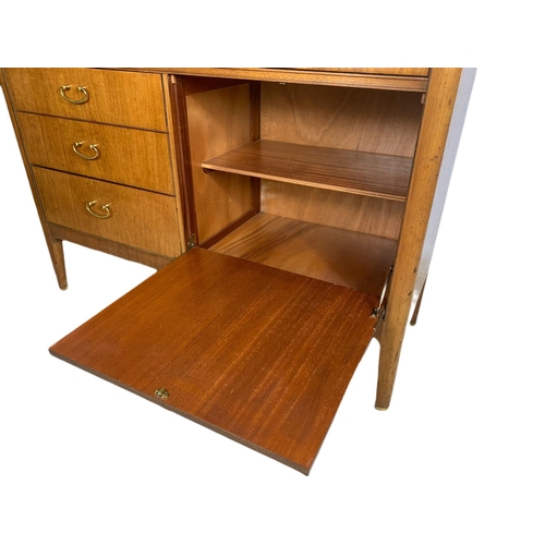 1093 - 1960’s teak mid century cocktail/writing cabinet with fitted interior.  114/41/114cm