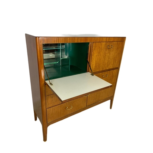 1093 - 1960’s teak mid century cocktail/writing cabinet with fitted interior.  114/41/114cm