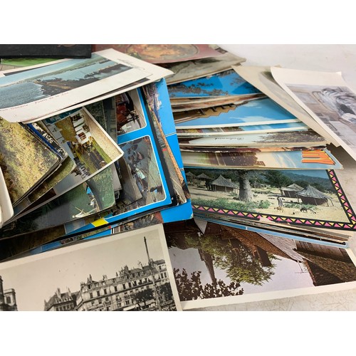 702a - Quantity of postcards and old photographs.