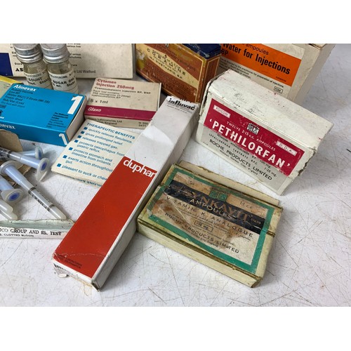 104d - Vintage medicine boxes and medical needles etc.