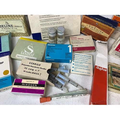 104d - Vintage medicine boxes and medical needles etc.