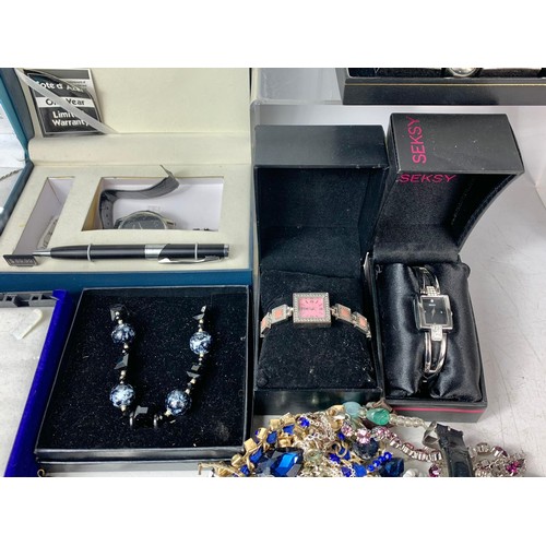 709b - Quantity of costume jewellery and watches.