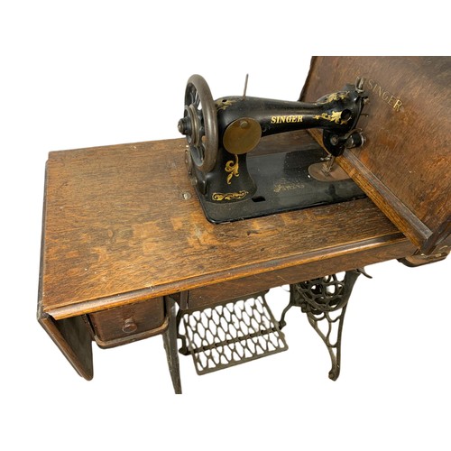 1122 - Vintage Singer sewing machine table.  89x42x102cm