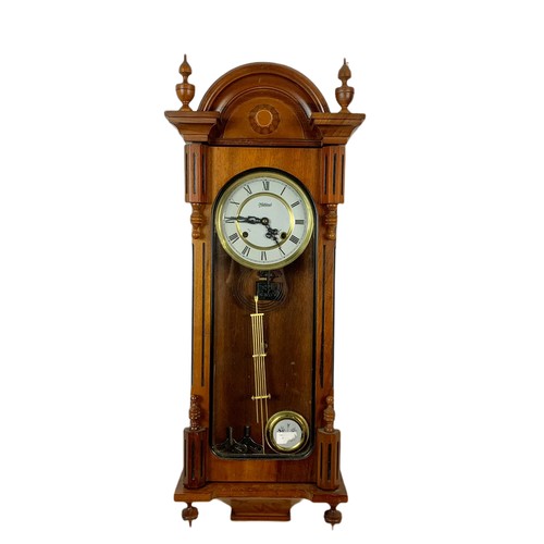 1130 - Modern mahogany wall clock, with keys and pendulum. 91cm