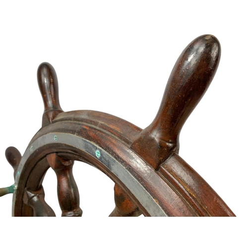 19 - Edwardian mahogany and brass ships wheel. 81cm