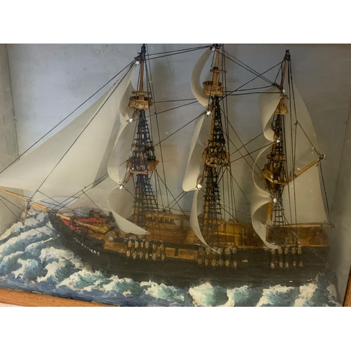 37 - Vintage model ship in a display box. 47.5/16/37cm