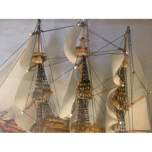 37 - Vintage model ship in a display box. 47.5/16/37cm