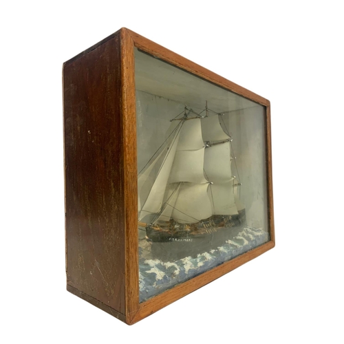 37 - Vintage model ship in a display box. 47.5/16/37cm