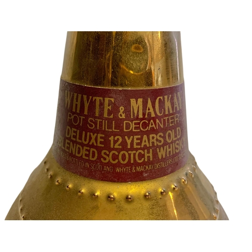 67 - Whyte & Mackay gold pot still decanter. 12 years old. Damaged corked