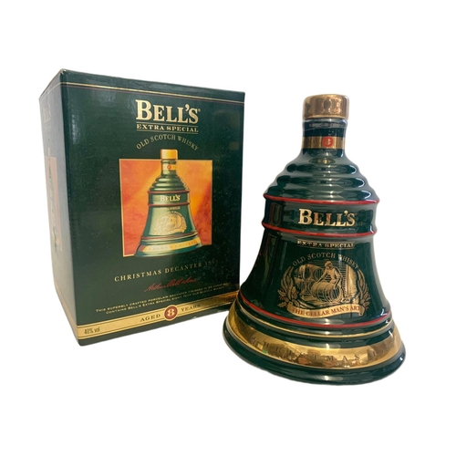 77 - Unopened Bell’s Extra Special Old Scotch Whisky. The Cellar Man’s Art. Christmas Decanter 1995. 70cl... 