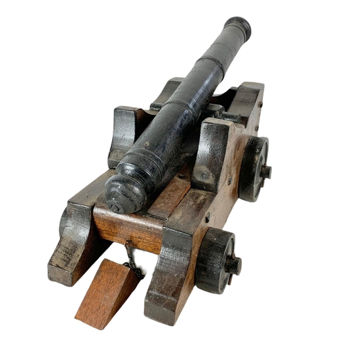 84 - Large wooden model cannon. 60/27/21cm