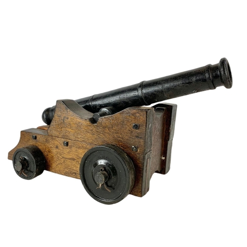 84 - Large wooden model cannon. 60/27/21cm