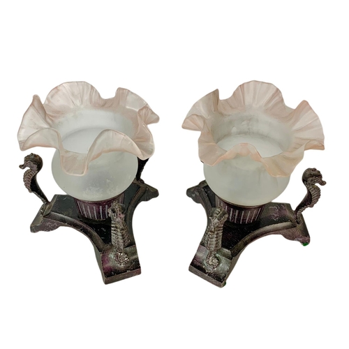 104 - Pair of vintage spelter base candle holders with glass shades. 17 x 19cm.