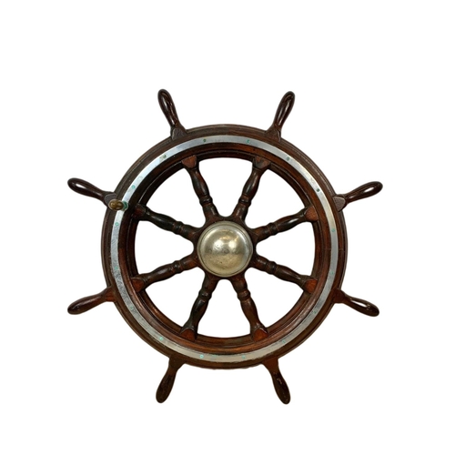 19 - Edwardian mahogany and brass ships wheel. 81cm