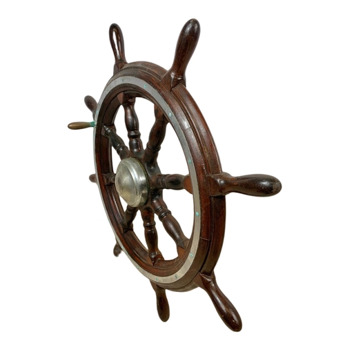 19 - Edwardian mahogany and brass ships wheel. 81cm