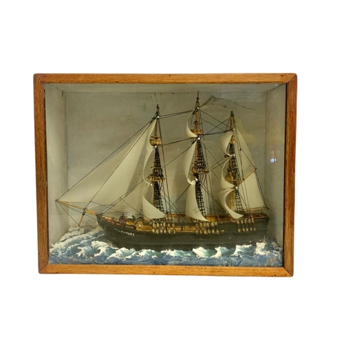 37 - Vintage model ship in a display box. 47.5/16/37cm