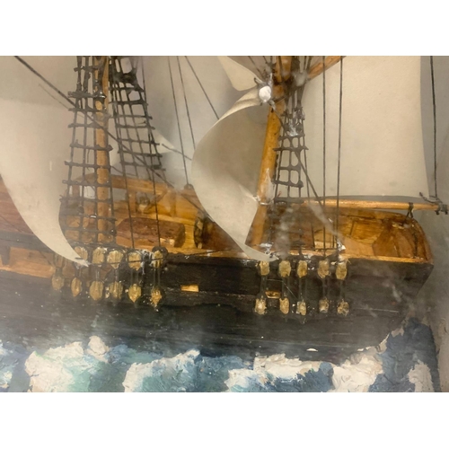 37 - Vintage model ship in a display box. 47.5/16/37cm