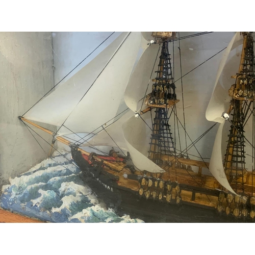 37 - Vintage model ship in a display box. 47.5/16/37cm