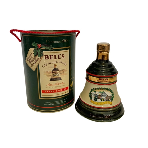 56 - Unopened Bell’s Old Scotch Whisky Extra Special Christmas 1990. By Wade finished in 22ct gold.