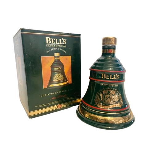 73 - Unopened Bell’s Extra Special Old Scotch Whisky. The Blenders Art. Christmas Decanter 1994. By Wade.... 