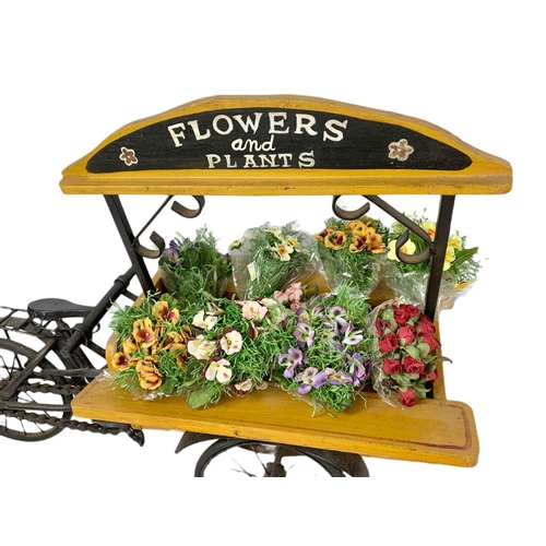 87 - Model flowers and plant holder. 61/45cm