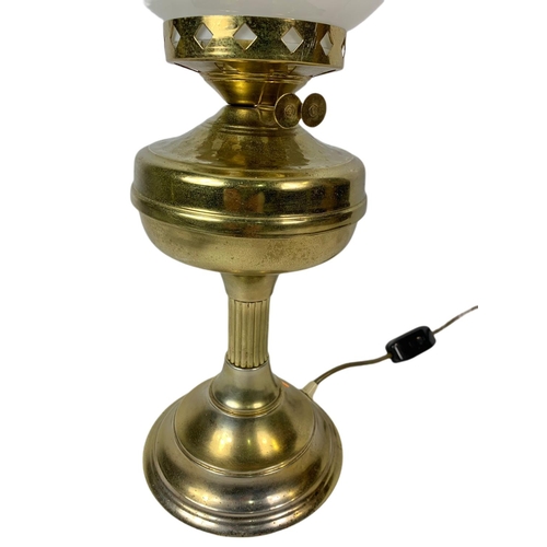 180 - Brass oil lamp electrified. 57cm