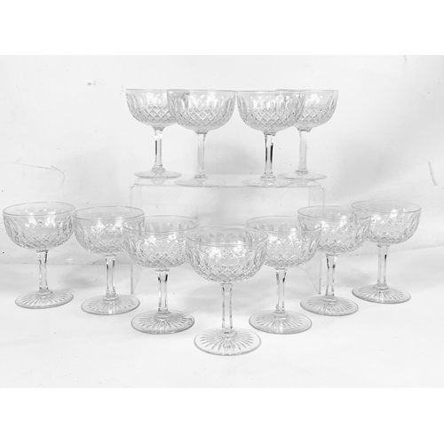 580 - 11 crystal champagne glasses. 11.5cm