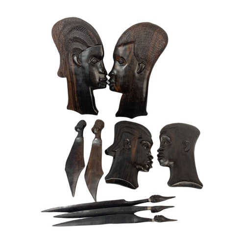 582 - Quantity of heavy wooden African figures. Largest 28cm