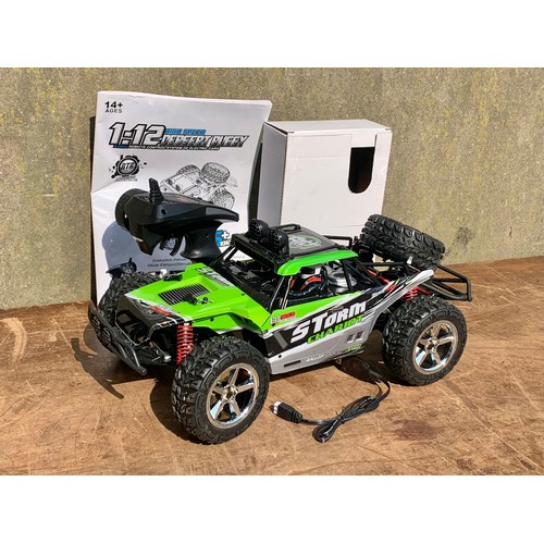 6 - Remote control Storm Chariot car. Infinite Power. With remote and lead. Car measure 42cm