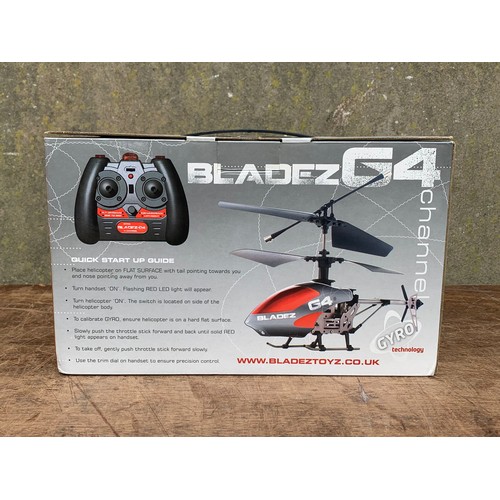 16 - Bladez Toyz PLC Bladez G4 remote control helicopter in box. Box measures 26 x 15 x 16cm