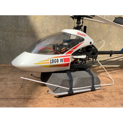 18 - Graupner JR 7053 Mikado Logo 10 helicopter in case. Case measures 107 x 22 x 41cm