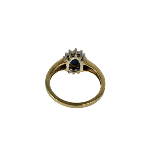 657 - 18ct gold, 0.33ct Diamond, Oval Cut Sapphire ring.