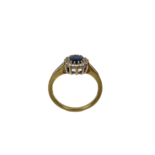 657 - 18ct gold, 0.33ct Diamond, Oval Cut Sapphire ring.