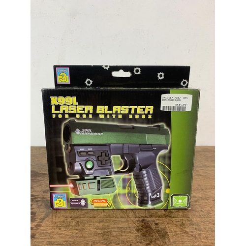 144 - XBOX Laser Blaster X99L in box. Box measures 20.5cm