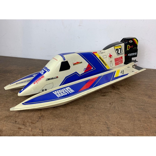 173 - Kyosho Wave Master remote control boat. 67cm