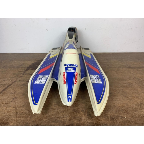 173 - Kyosho Wave Master remote control boat. 67cm