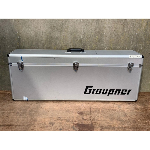 18 - Graupner JR 7053 Mikado Logo 10 helicopter in case. Case measures 107 x 22 x 41cm