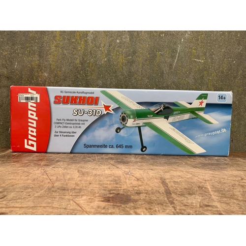 26 - Graupner Sukhoi SU-31D plane in box. RC-Semiscale-Kunstflugmodell. Box measures 68 x 20 x 9cm