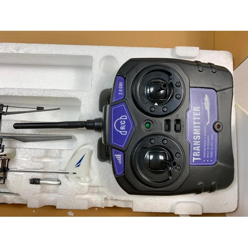 36 - Sky Tango remote control helicopter 2.4GHZ radio receiver transmitter in box. Box measures 47 x 23.5... 