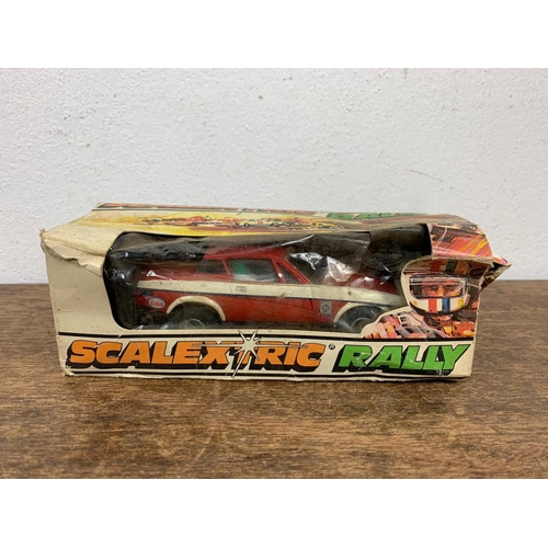 41 - 2 vintage Scalextric cars. Scalextric Rally C113 Triumph TR7 in box. Box measures 19cm.