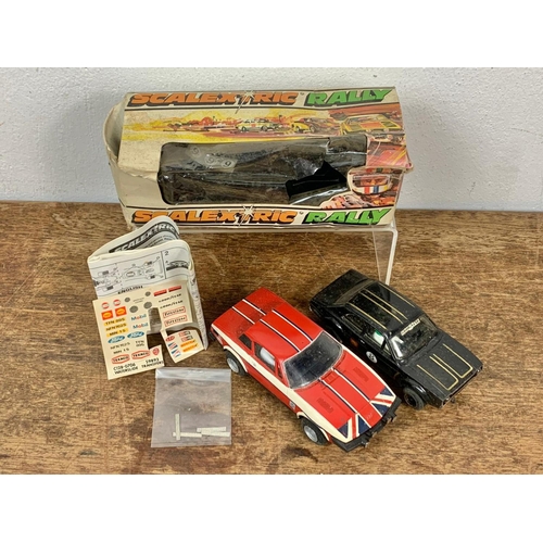 41 - 2 vintage Scalextric cars. Scalextric Rally C113 Triumph TR7 in box. Box measures 19cm.