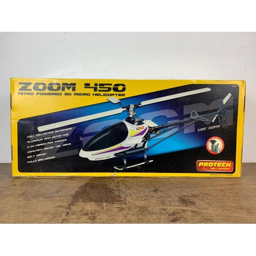 66 - Protech Heli Division Zoom 450 Nitro Powered 3D Micro Helicopter in box. Box measures 75 x 32cm