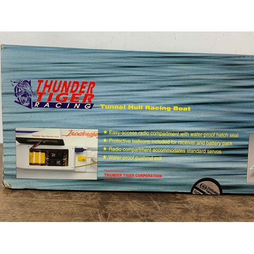 69 - Thunder Tiger Racing. Falcon 3.5 Tunnel Hull Racing Boat in box. With Thunder Tiger’s Pro-21M-OB 3.5... 