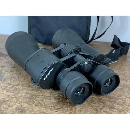 76 - 2 pair of binoculars in cases. Rocktrail and Luxon. Largest pair 19.5 x 23.5cm