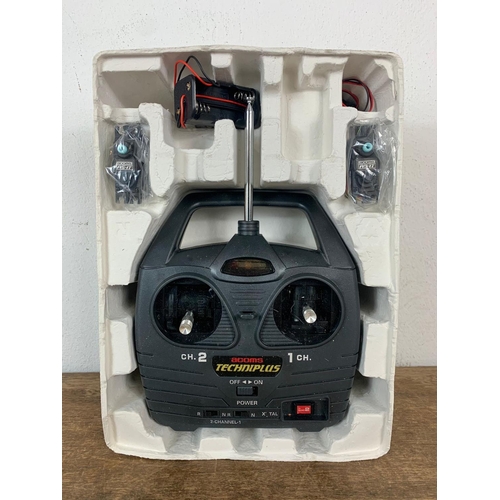 87 - Acoms Techniplus radio control system. Think Happy Remote control. Box measures 29.5 x 11 x 21.5cm