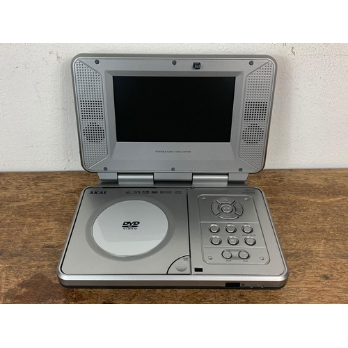 89 - Akai Portable DVD Video player in case with accessories